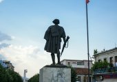 Monument in pedestrian street in Korça